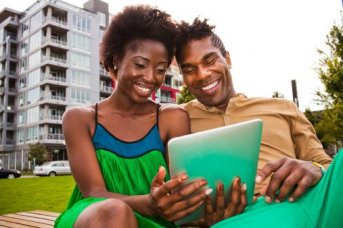 Couple Using Tablet